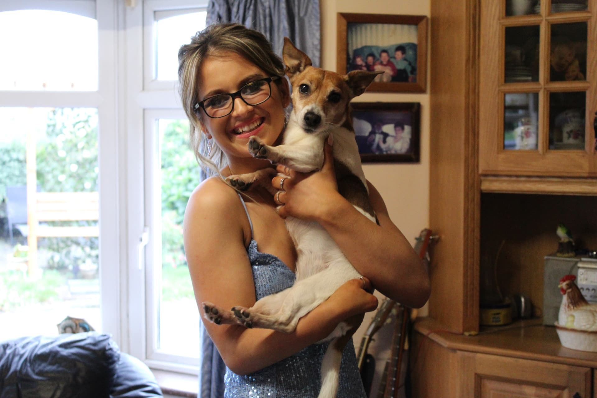 Amy of Hollzphotography with her childhood dog Holly, the namesake of the business